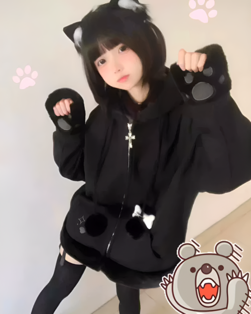 Person wearing a Neko Paw Hoodie with cat paw sleeves.