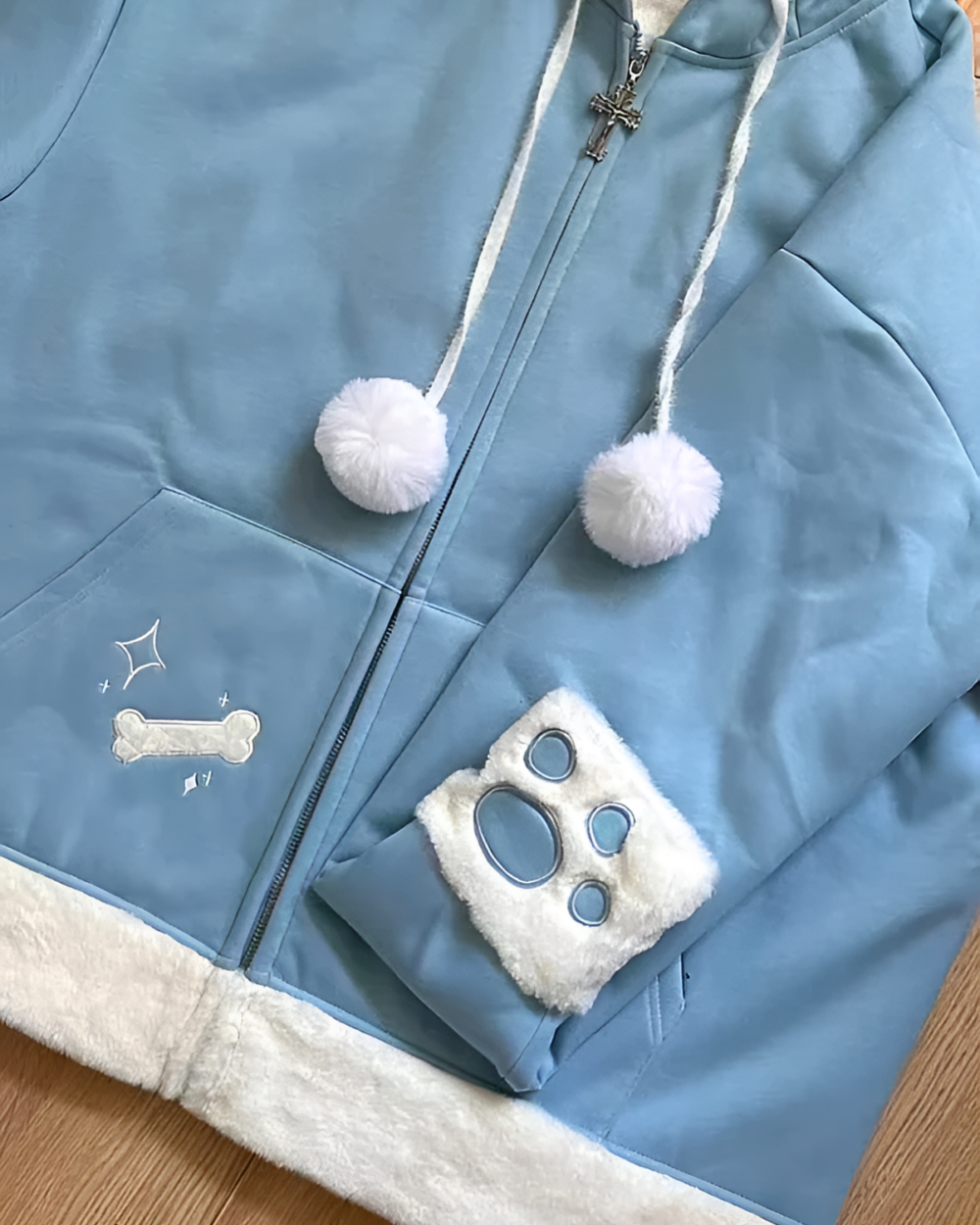 Blue Neko Paw Hoodie featuring paw prints, a bone, and pom-poms. Harajuku aesthetic zip-up sweatshirt.