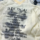 Off-Shoulder Grunge Butterfly Top, featuring a distressed, floral print and lace details.