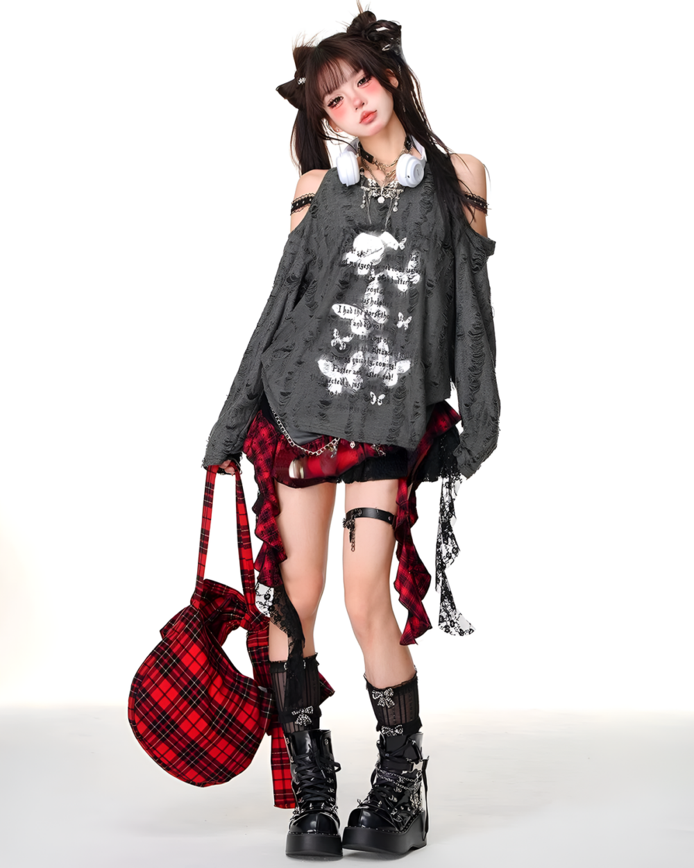 Off-shoulder Grunge Butterfly Top with distressed details and layered styling.