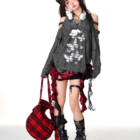 Off-shoulder Grunge Butterfly Top with distressed details and layered styling.