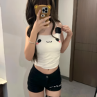 Person wearing a Kawaii Panda Vest Top, black shorts, and thigh-high socks.