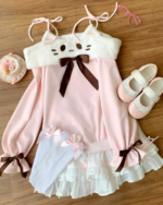 Pink Neko Sweatshirt featuring a cat hood, ruffles, and bow accents. Cutecore style outfit.