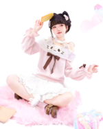 Pink Neko Sweatshirt featuring a cute girl model in a cutecore aesthetic outfit.