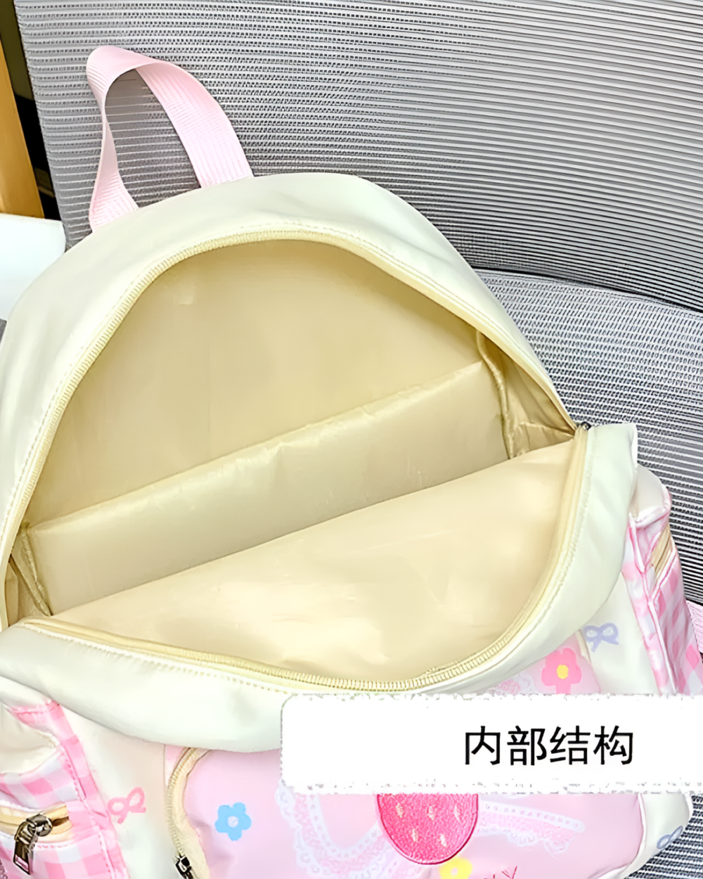 Close-up of the Plaid Strawberry Backpack, Jojifuku Aesthetic, featuring a white exterior and floral details.