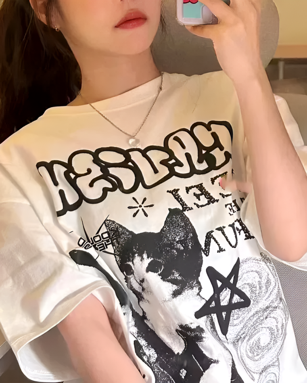 Rocker Cat White T-Shirt with graphic design featuring text and star motifs.