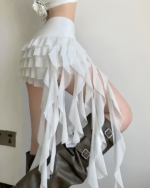 White Ruffles Low-waisted Coquette Aesthetic Skirt with layered ruffles and straps.