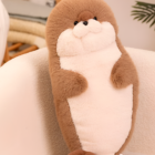 Brown Kawaii Seal Plushie resting on a chair, soft plush toy design.