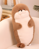 Brown Kawaii Seal Plushie resting on a chair, soft plush toy design.