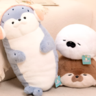 Two Kawaii Seal Plushies, one blue and one brown, displayed side-by-side.