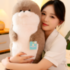 A Kawaii Seal Plushie, a soft and cuddly stuffed animal, held by a woman.