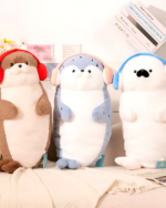 Two Kawaii Seal Plushies, one light blue and one brown, with headphones.