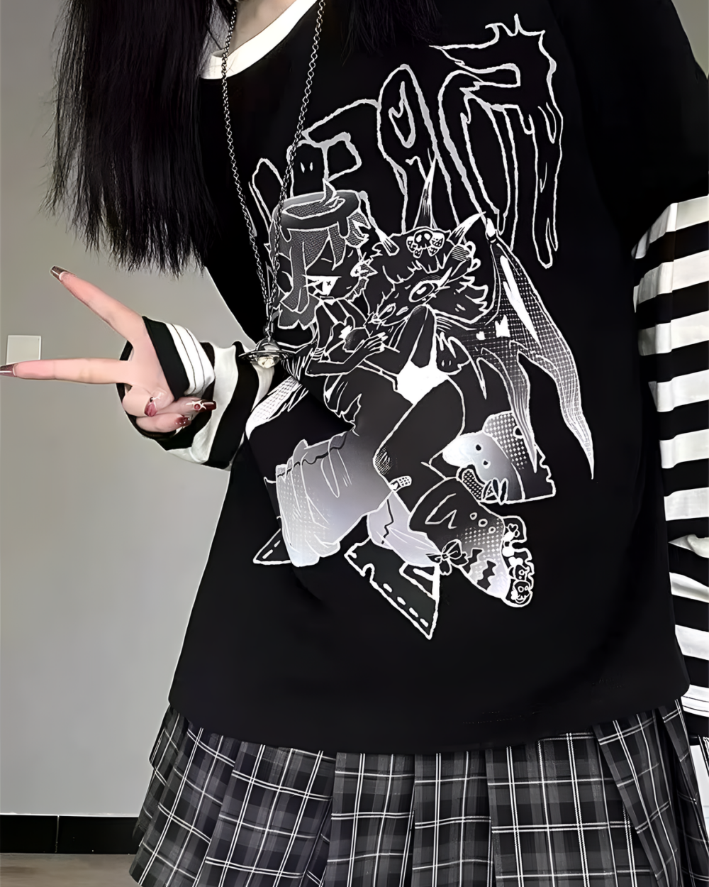 Black Animecore Aesthetic Tee with striped sleeves and a white graphic print.