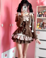 A Sweet Lolita Set featuring a brown ruffled jacket and plaid skirt.