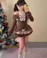Young woman wearing a Sweet Lolita Set, brown sweater, plaid skirt, and white socks, festive background.