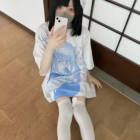 White loose Animecore Aesthetic Tee featuring a blue anime-style print, worn by a person.