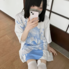 White loose Animecore Aesthetic Tee with blue watercolor print and phone.