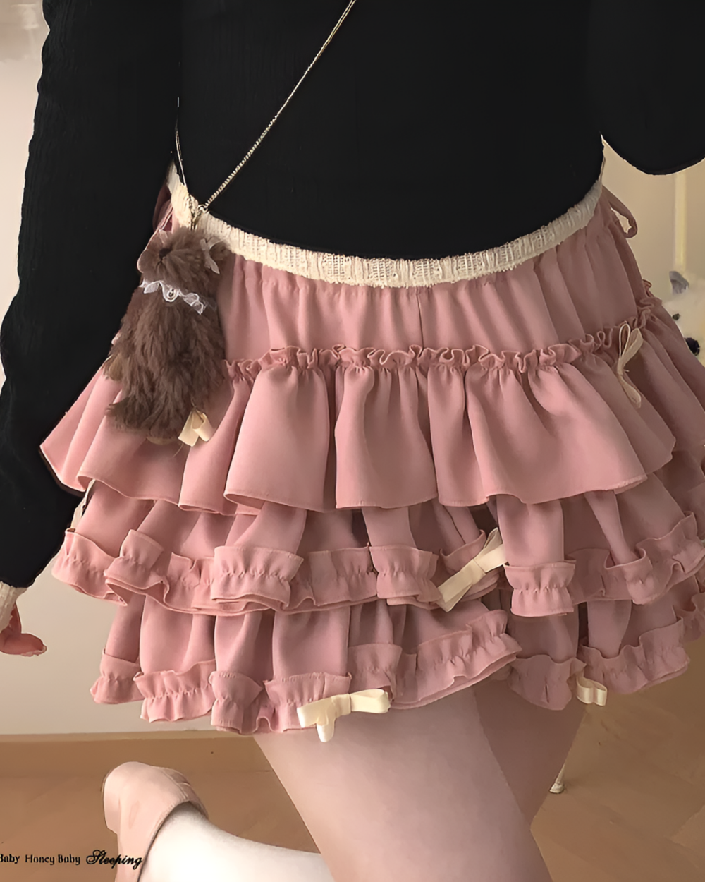 Pink ruffled mini skirt with bows, showcasing the Yume Kawaii Aesthetic.