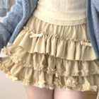 Yume Kawaii Aesthetic ruffled mini skirt with layered ruffles and bows. A cute, layered skirt.