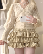 Yume Kawaii Aesthetic ruffled mini skirt, layered ruffles, cream color.