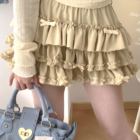 Yume Kawaii Aesthetic ruffled mini skirt with layered ruffles and bows.