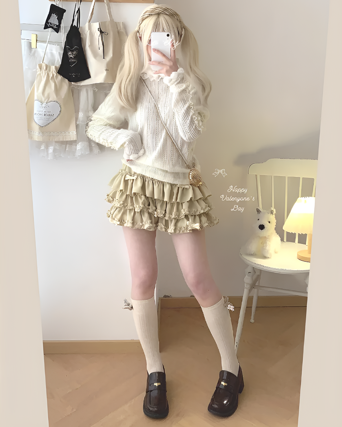 Model wearing a beige, ruffled mini skirt – Yume Kawaii Aesthetic outfit with a cream sweater and socks.