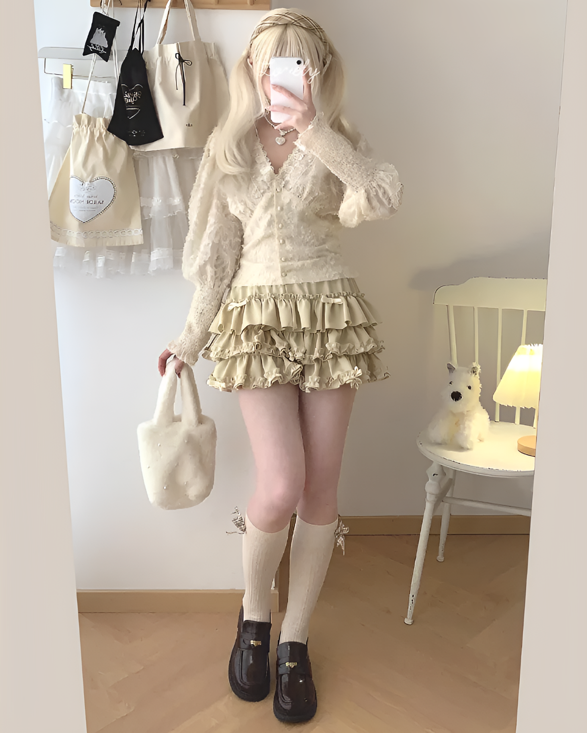 Yume Kawaii Aesthetic ruffled mini skirt outfit featuring a cream-colored top and socks.