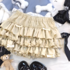 Yume Kawaii Aesthetic ruffled mini skirt in cream, layered ruffles, kawaii style outfit.