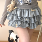 Yume Kawaii Aesthetic ruffled mini skirt, light blue, layered ruffles, with straps.