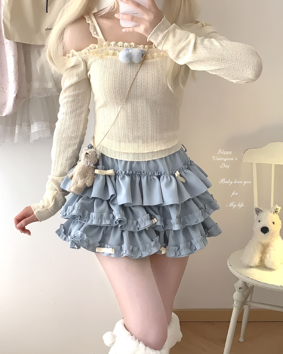 Yume Kawaii Aesthetic ruffled mini skirt paired with a cream sweater. Layered, ruffles detail.