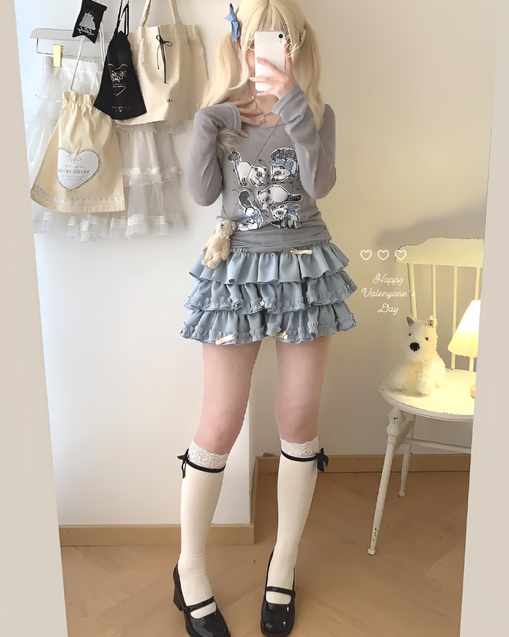 Yume Kawaii Aesthetic ruffled mini skirt paired with a sweater and socks, showing a layered outfit.
