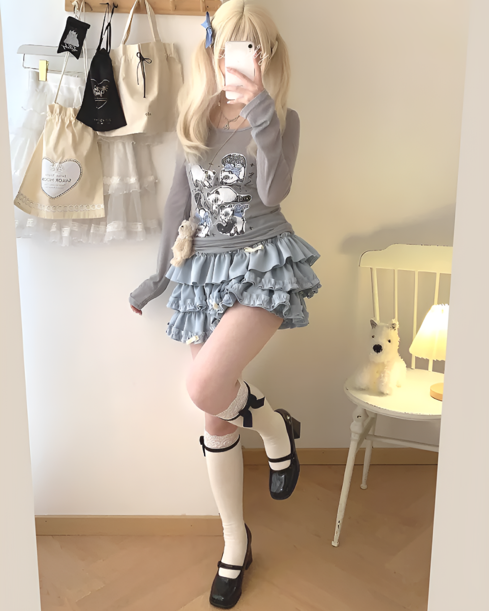 Yume Kawaii Aesthetic ruffled mini skirt, light blue, layered with a long-sleeved shirt and socks.
