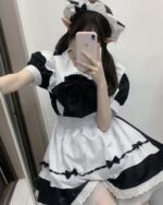 A black and white Kawaii Maid Uniform Set with bow details and headband.