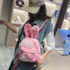 Pink Rabbit Ears Plush Backpack worn by a person. Cute and adorable backpack with plush rabbit ears.