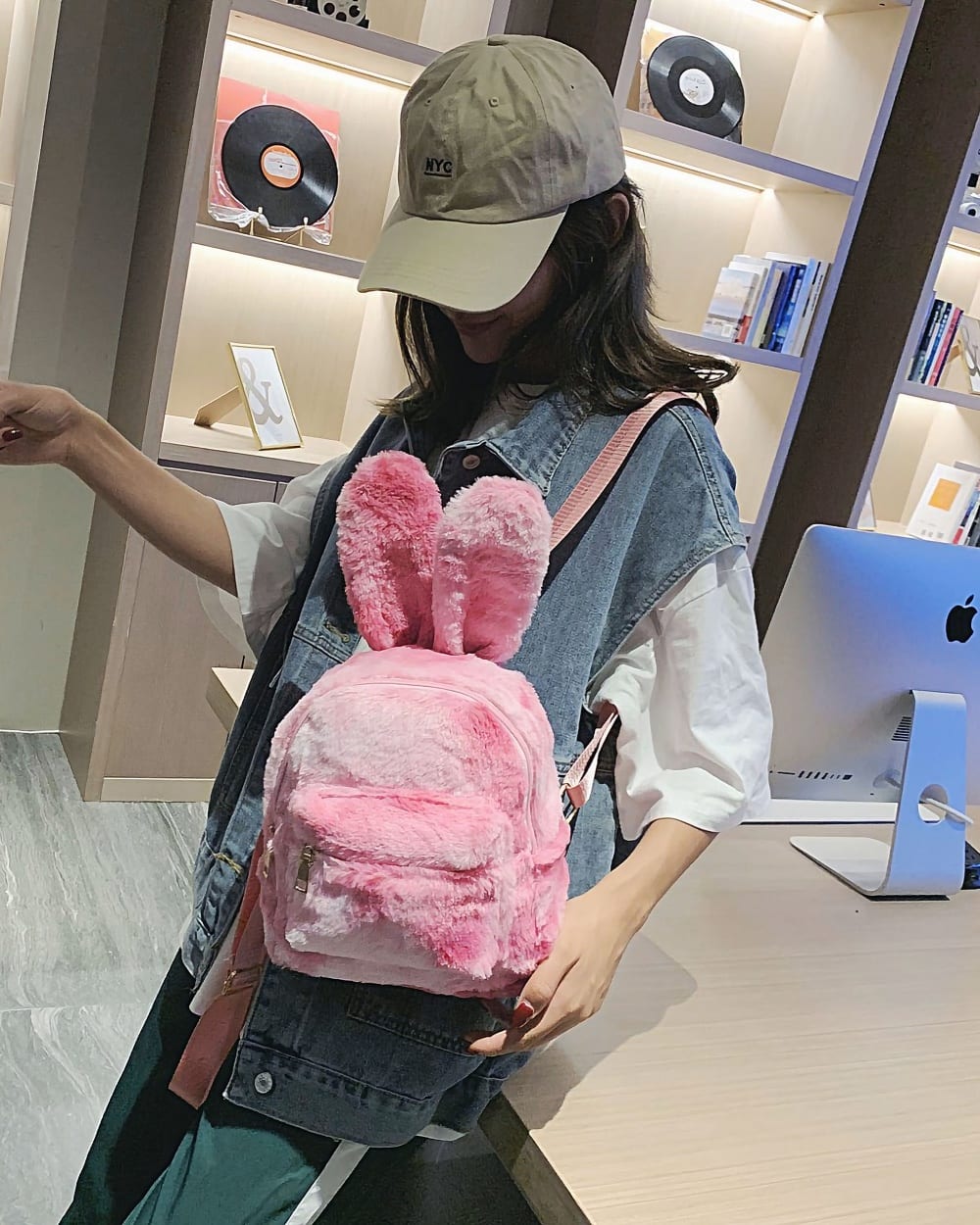 Pink Rabbit Ears Plush Backpack worn by a person. Cute and adorable backpack with plush rabbit ears.