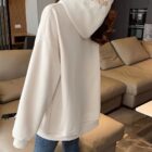 Cream-colored Ethno-Chic Hoodie featuring embroidered details, thick fabric.