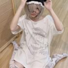 Model wearing a Cat Girl Oversized T-Shirt with anime cat ears and a maid headband.