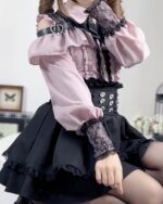 Off-shoulder blouse and skirt set featuring a Jirai Kei Aesthetic, with lace details and a corset.