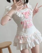 Ruffled Cake Skirt - Yume Kawaii Skirt with pink accents and a graphic print.
