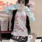 Long Sleeves Mezzo Piano T-Shirt featuring pastel pink and character illustrations.