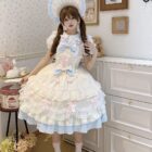 A woman wearing a Frilly Ribbon Dress - Hime Lolita Dress, with layered ruffles and a matching bonnet.