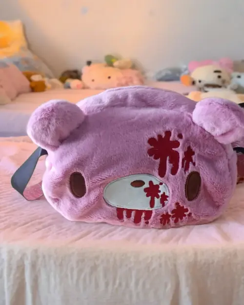 Purple Gloomy Bear Plush Bag with cute face details and a handle.