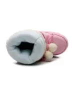 Close-up of Pink Fluffy Boots featuring a fluffy lining and pom-poms.