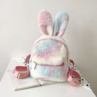 Cute Rabbit Ears Plush Backpack, a soft pink and white backpack with bunny ears and shoulder straps.