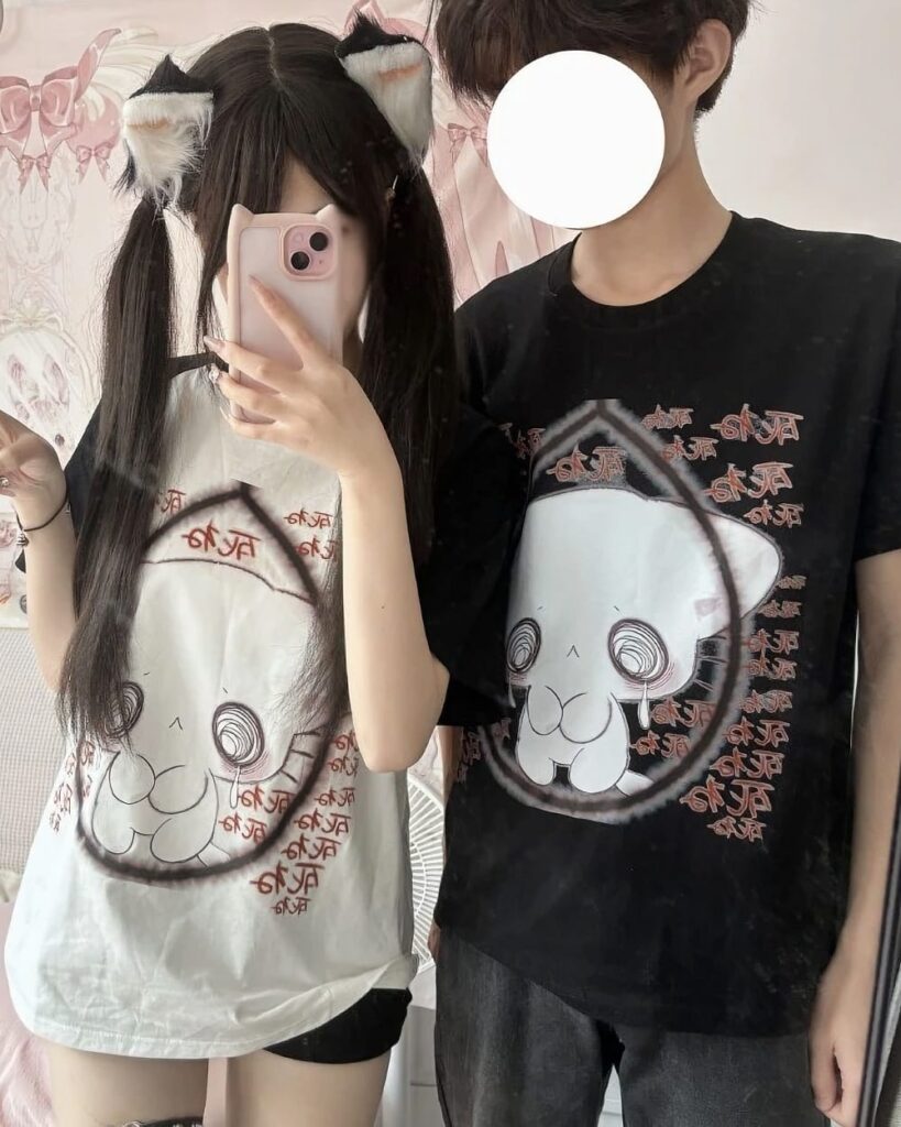 Black Neko Print Matching T-Shirt featuring cute cat character art on a white shirt.