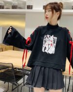 Black Kitsune Bowed Sweatshirt with anime graphic, featuring red accents and ruffled skirt.
