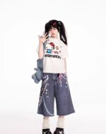 Rainbow Chain Print Y2K Aesthetic Pants featuring a denim wide-leg design with colorful embellishments.