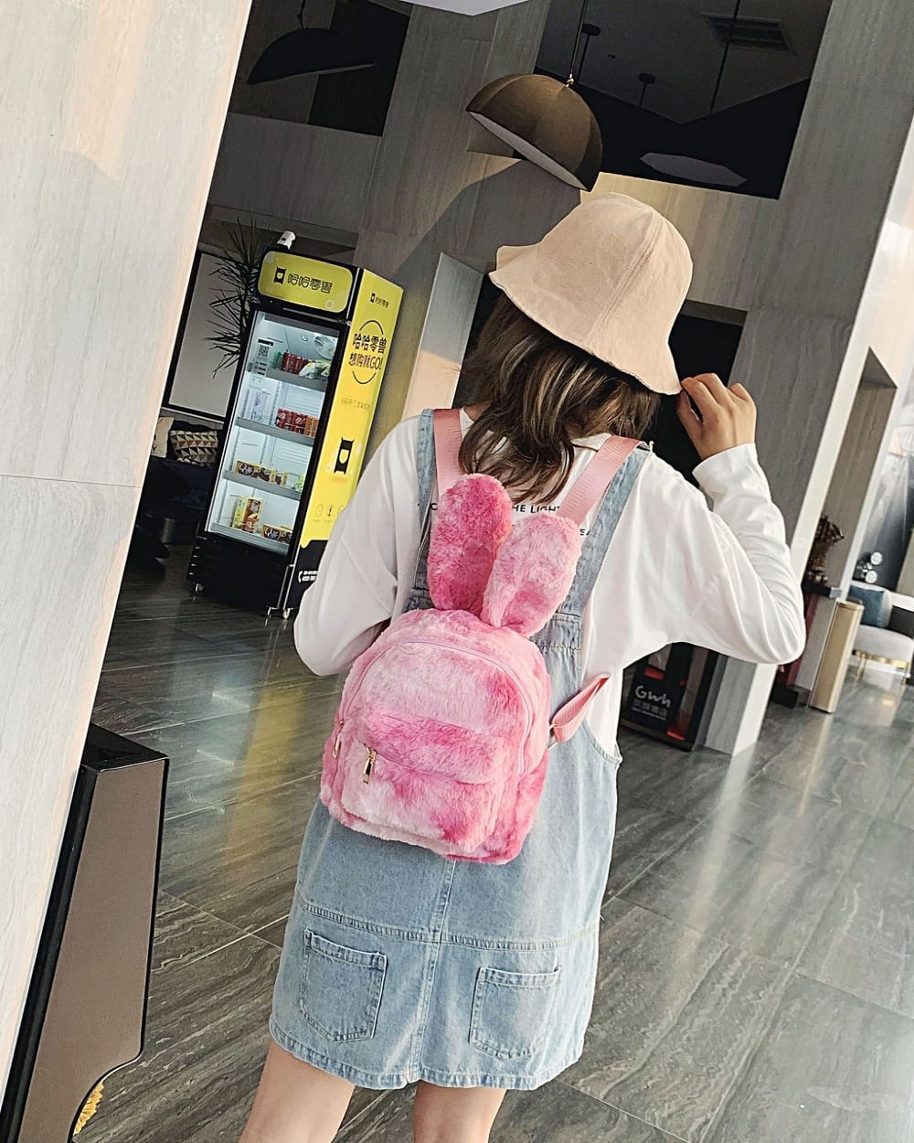 Pink Rabbit Ears Plush Backpack, a soft and adorable backpack for kids.
