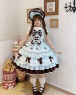 A Frilly Ribbon Dress - Hime Lolita Dress in a light blue and brown color, featuring layered ruffles and bows, worn by a model.