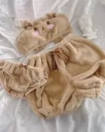 Close-up of Soft Plush Bear Pajamas - Kawaii Clothes, featuring a brown plush jumpsuit with bow accents.